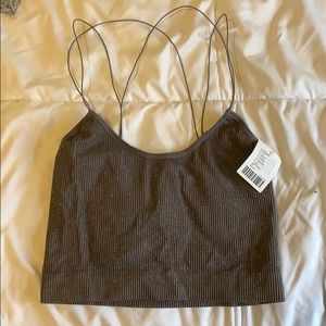 Out from under Urban Outfitters glitter cami